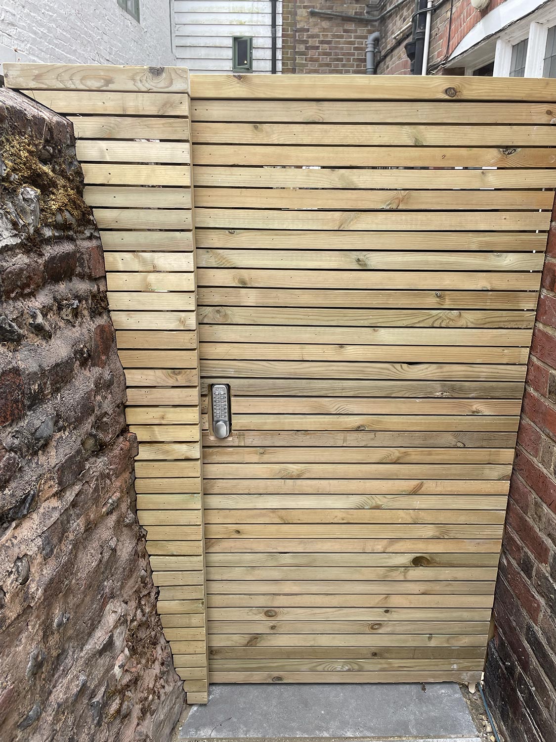 Custom timber gate built for an Arundel business.