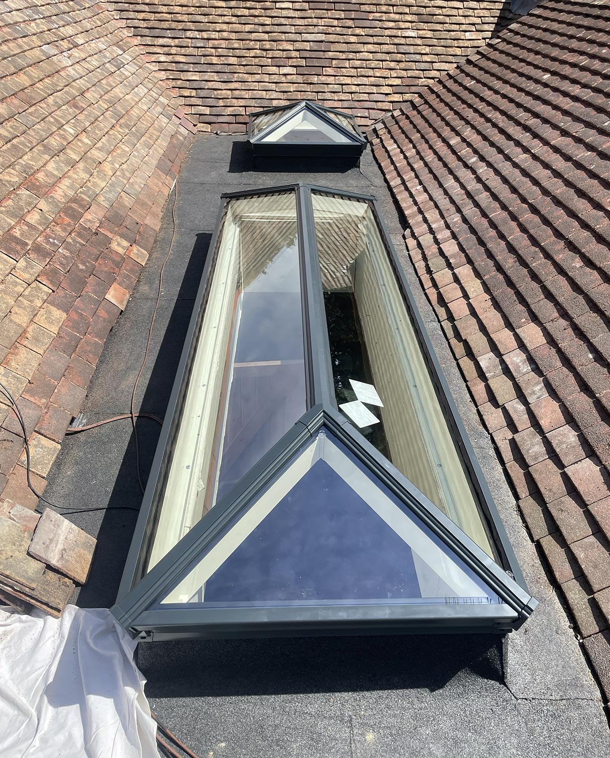 Roof altered and trimmed out to take a new skylight lantern.